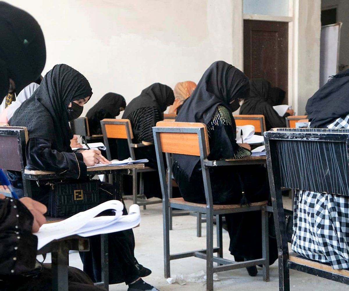 Students writing during a class in a classroom